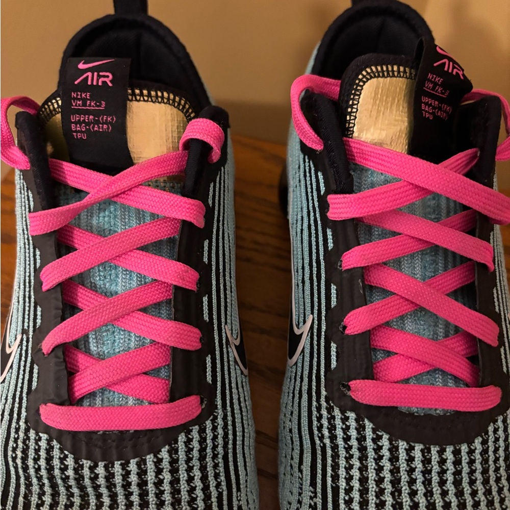 Nike Air Sneakers with Turquoise and Pink Accents